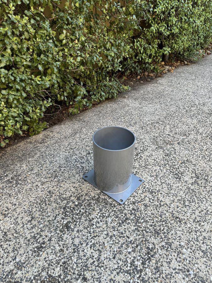 In-ground sleeve with cover collar at surface level